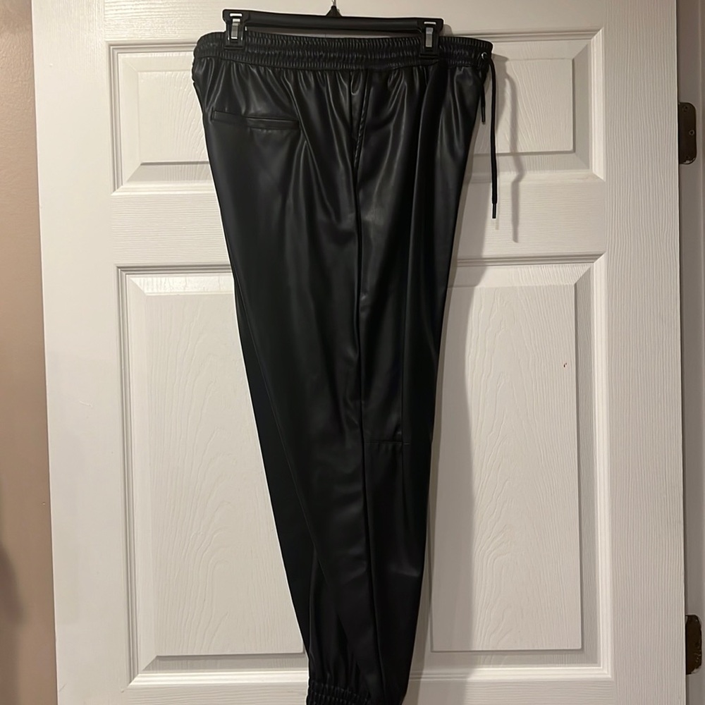 Women’s black leather joggers in a size L